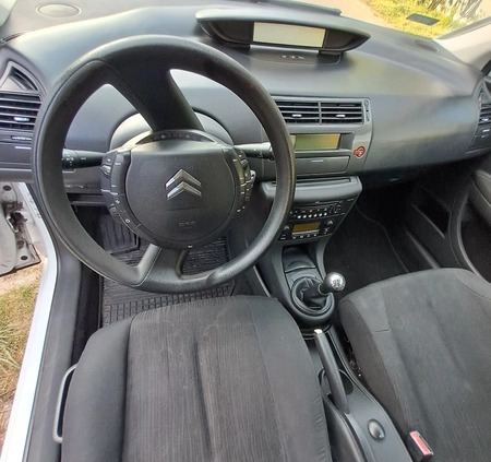 Citroen C4 cena 12000 przebieg: 228150, rok produkcji 2010 z Puszczykowo małe 92